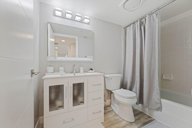 4101 N Ocean Blvd Unit D-308, Boca Raton, FL 33431 - bathroom with vanity, shower / bath combination with curtain, and wood finished floors