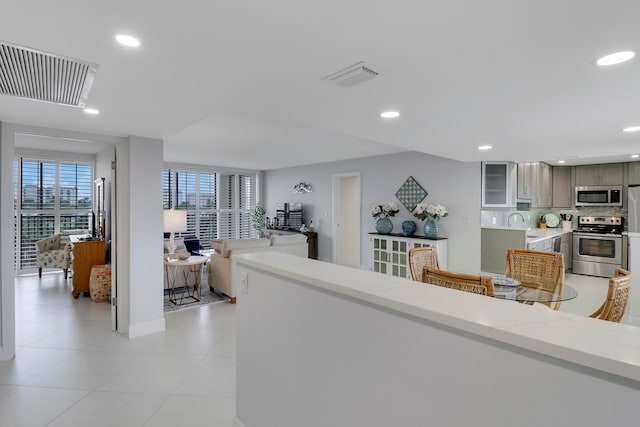 living room featuring light tile patterned floors