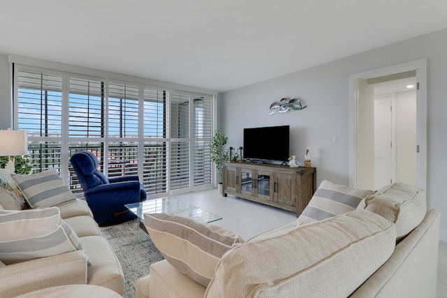 living room with light tile patterned floors