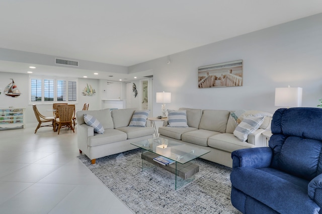 living room featuring light tile patterned floors