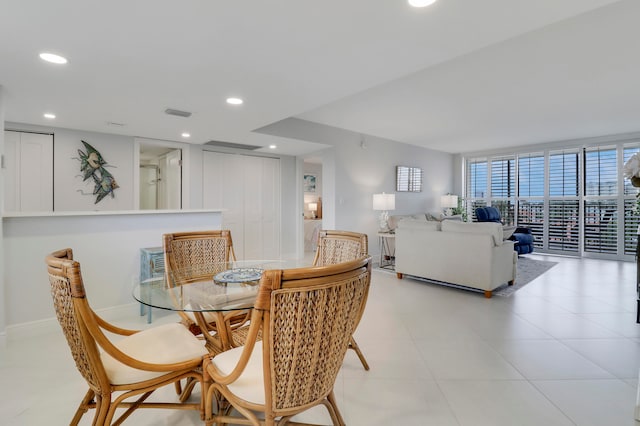 dining room with expansive windows