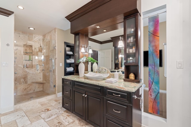 bathroom featuring vanity, walk in shower, and ornamental molding