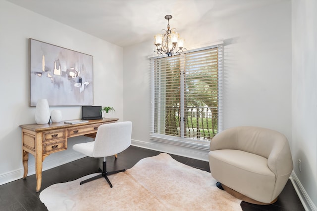 office area featuring wood-type flooring and an inviting chandelier