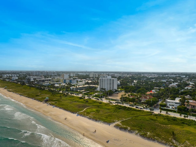 drone / aerial view with a view of the beach and a water view