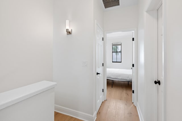 hallway featuring light hardwood / wood-style flooring