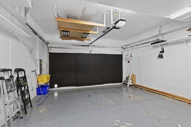 garage featuring a garage door opener