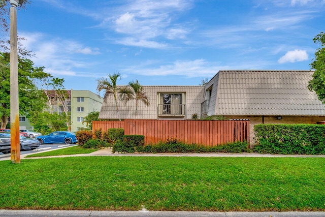 exterior space featuring a lawn