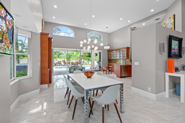 dining room featuring a high ceiling