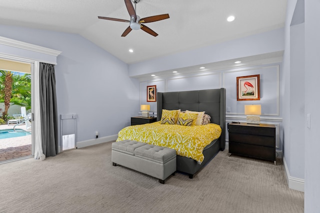 carpeted bedroom with vaulted ceiling, access to outside, and ceiling fan