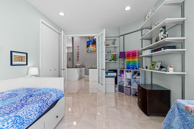 bedroom with a textured ceiling