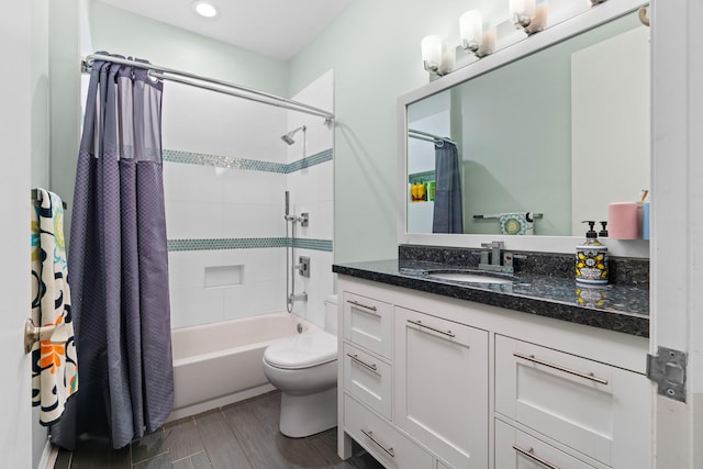 full bathroom featuring vanity, toilet, wood-type flooring, and shower / tub combo with curtain