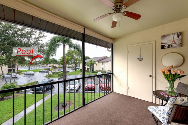 balcony featuring ceiling fan