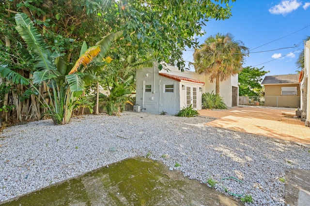 view of yard featuring french doors