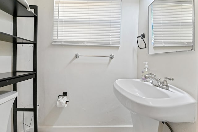 bathroom with sink and toilet