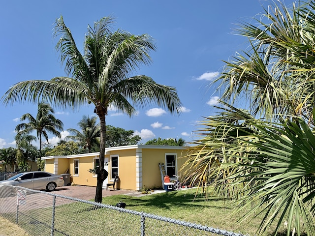 view of home's exterior featuring a yard