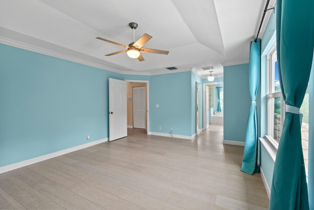 unfurnished room featuring ornamental molding, ceiling fan, and light hardwood / wood-style floors