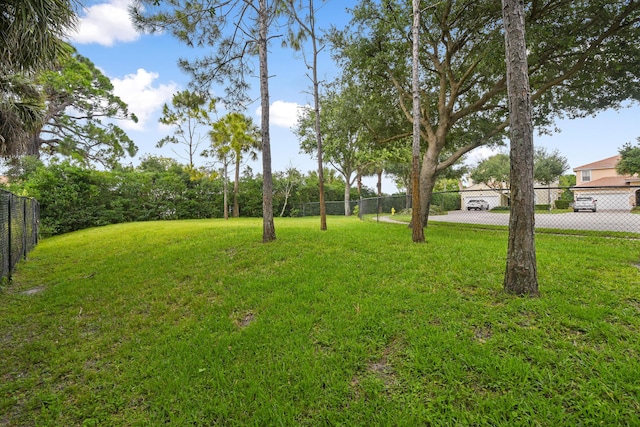 view of yard with fence