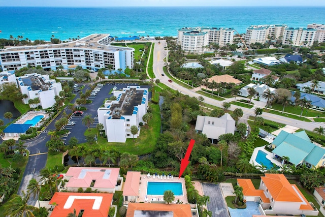 birds eye view of property featuring a water view