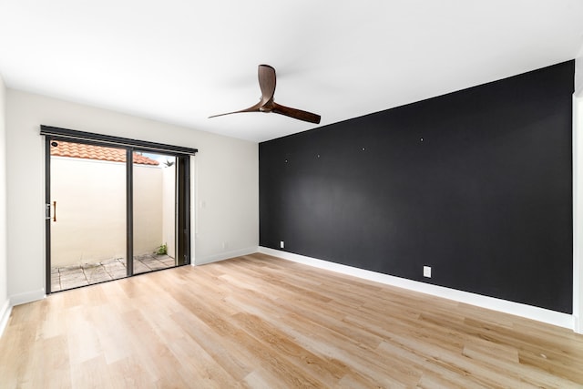 unfurnished bedroom with light wood-type flooring and ceiling fan