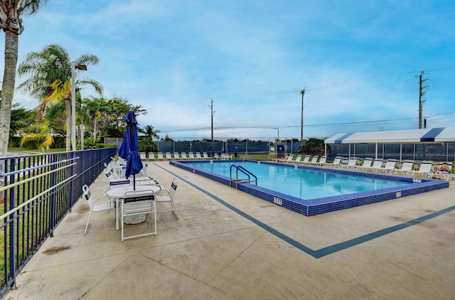 view of pool with a patio area