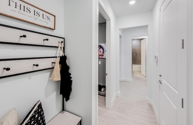 mudroom featuring baseboards and recessed lighting