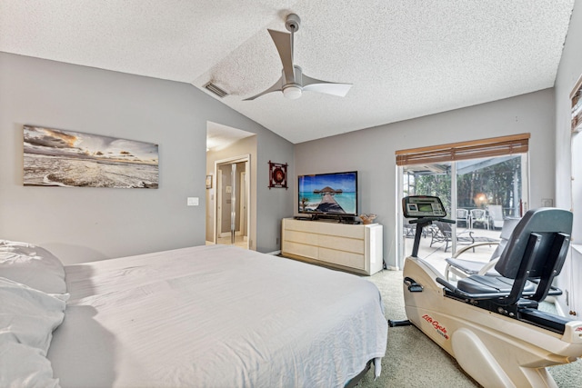 carpeted bedroom featuring ceiling fan, access to exterior, a textured ceiling, and vaulted ceiling