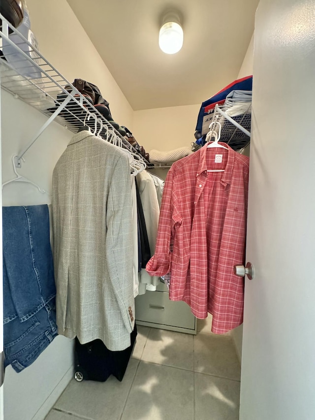 walk in closet featuring tile patterned floors