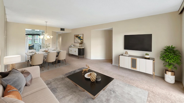 carpeted living room with a notable chandelier