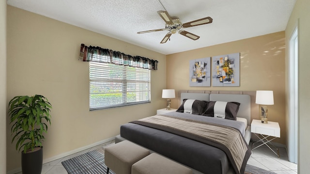 bedroom with ceiling fan and carpet flooring