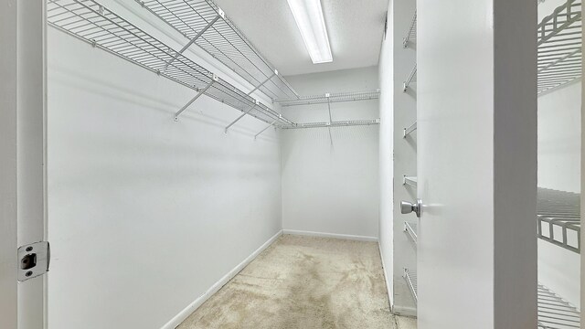 bathroom featuring vanity, toilet, tile patterned flooring, and an enclosed shower