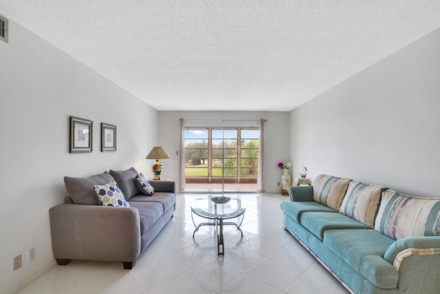 living room with a textured ceiling