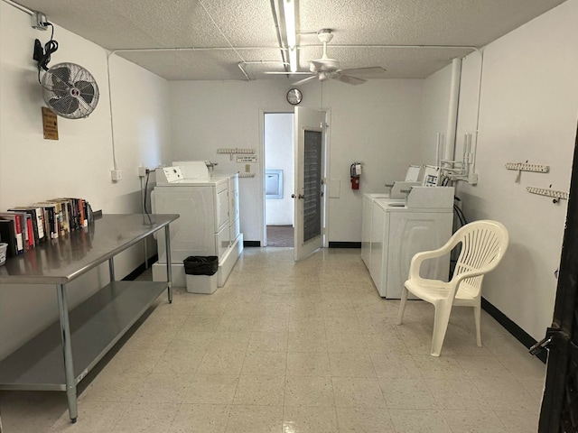 laundry area with washer and dryer and ceiling fan