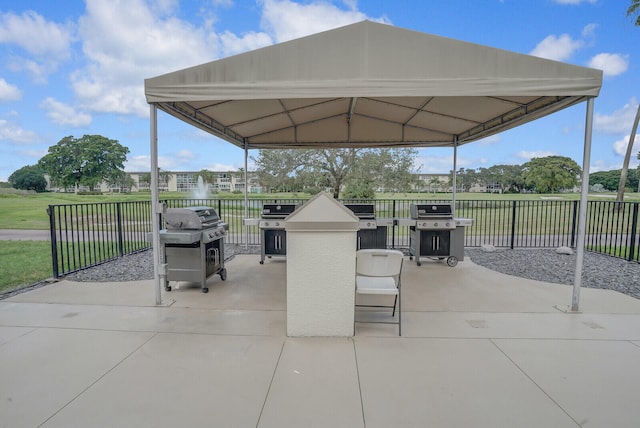 view of patio / terrace with a gazebo and grilling area