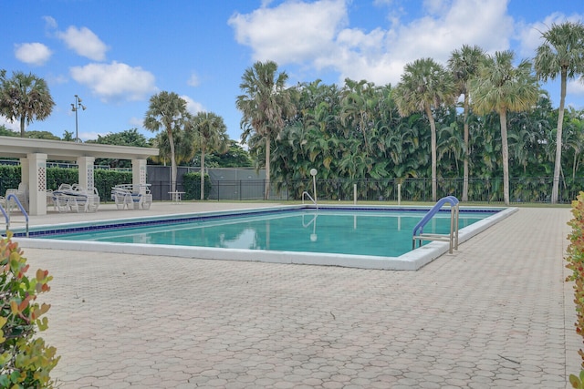 view of swimming pool featuring a patio