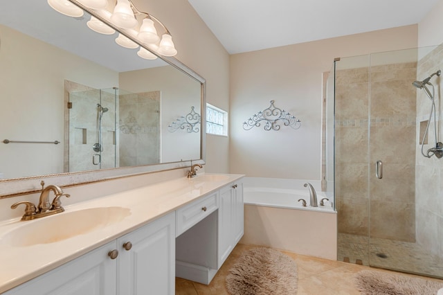 full bath featuring a shower stall, a garden tub, tile patterned floors, and double vanity