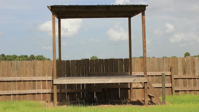 view of yard with a rural view