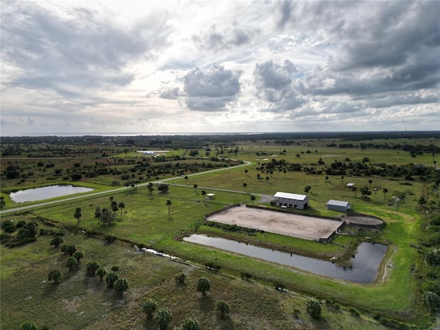 bird's eye view with a rural view and a water view