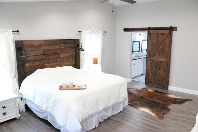 full bathroom featuring toilet, shower / tub combo with curtain, vanity, and hardwood / wood-style flooring