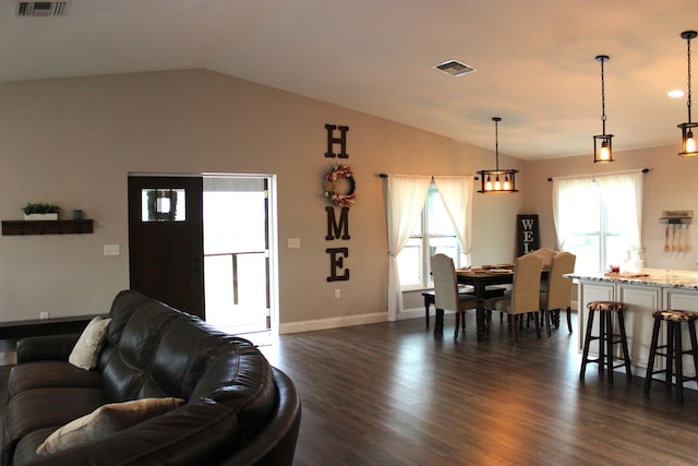 washroom with washer and clothes dryer and dark hardwood / wood-style floors