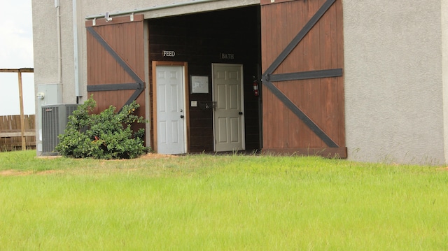 surrounding community featuring a lawn and an outdoor structure