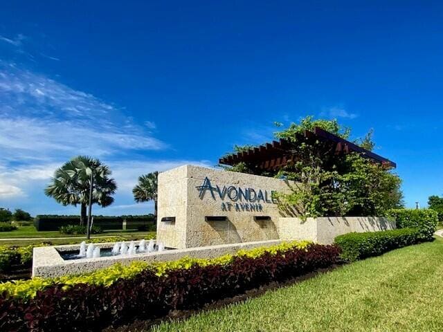 10574 Northbrook Cir Unit Prestige 049, Palm Beach Gardens, FL 33412 - community sign featuring a lawn