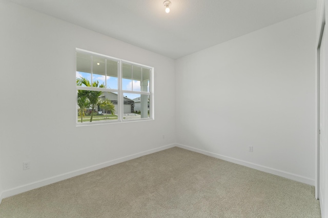 empty room featuring carpet flooring