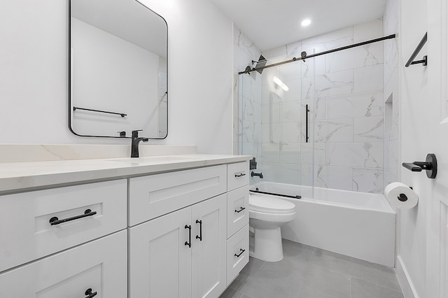 full bathroom featuring vanity, toilet, and combined bath / shower with glass door