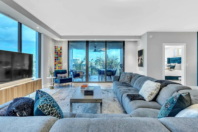 living room featuring hardwood / wood-style floors and a wall of windows