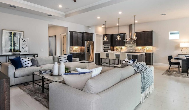 tiled living room with crown molding