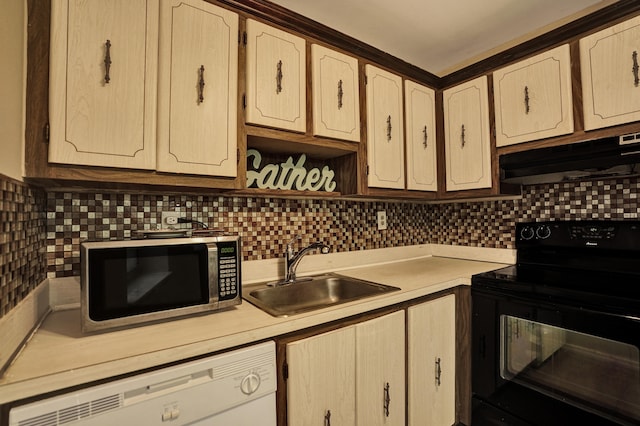 kitchen with dishwasher, electric range, backsplash, and sink