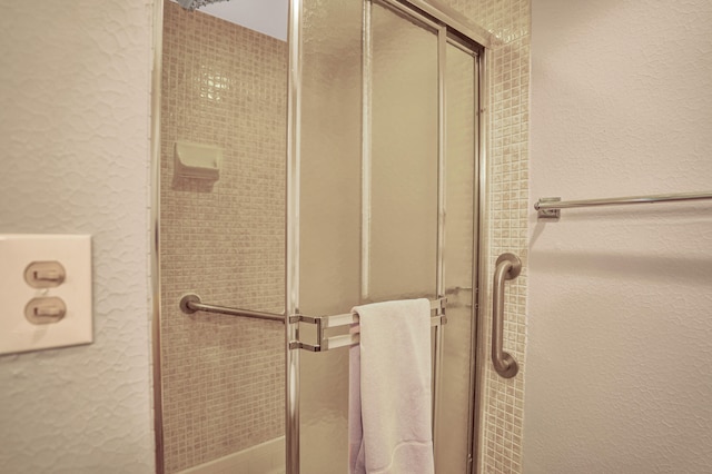 bathroom featuring walk in shower