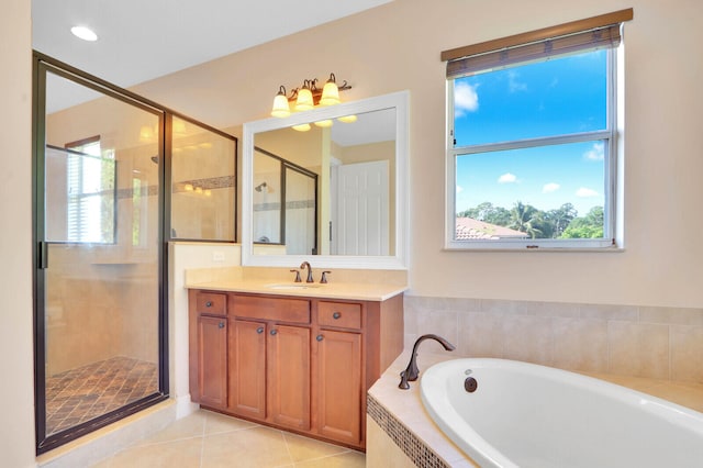 bathroom with vanity, separate shower and tub, and tile patterned flooring