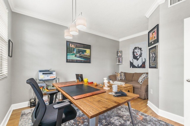 office featuring hardwood / wood-style flooring and ornamental molding