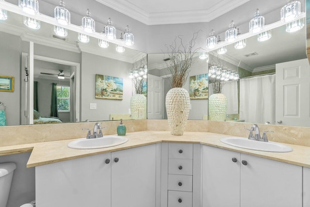 bathroom featuring a shower with curtain, ceiling fan, ornamental molding, and vanity